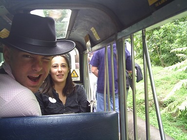 Raewyn Alexander; Cowboy Wink on the Train;'Bain Train' for a birthday. Bain chartered the Rainforest Express teeny train in the Waitakeres, Auckland, and some people dressed up