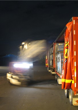 Brett Dickson; Loading Up; A forklift loads freight into a New Zealand Couriers truck at the company’s Auckland depot in Penrose