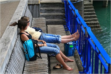 Dawn McKenzie; A hard days shopping!; Young Auckland Girls resting on the waterfront in Auckland City after a hard days shopping.