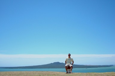 Steve Nicoll; Rangitoadstool; Perched on a toadstool at the top of Mount Victoria, Devenport with Rangitoto asthe backdrop.
