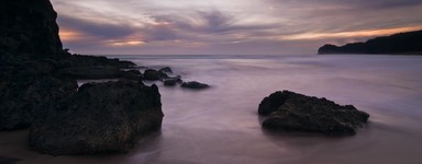 Ewen Cafe; Rising Tide; Long exposure image to capture the evening serenity on Piha Beach.