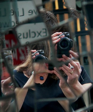  Self portrait taken in mirrors in shop in inner city.July 2008