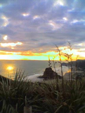  i took this photo of piha beach during sunset on cellphone
