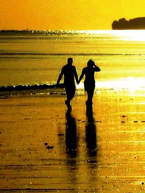 JERRY ZINN.;Romantic beach stroll.; It was one of those spectacular sunrises on Takapuna beach.