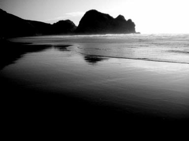 Katy Gundesen;Piha reflection; Taken at dusk on the empty beach