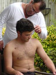 Kerry Murphy; Dad and son; Robert cutting sam's hair.