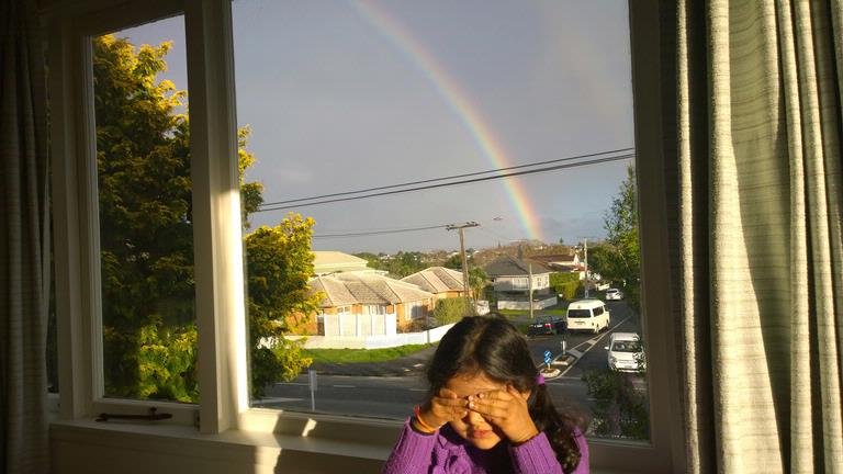 my daughter got blinded by the sun when I asked her to pose for a photograph. pic made with nokia mobile camera