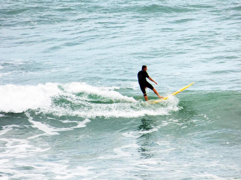 Kerri Walker;making it look easy;muriwai surfer