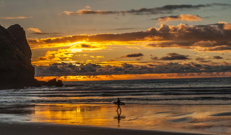  Surf at golden time in Piha Auckland