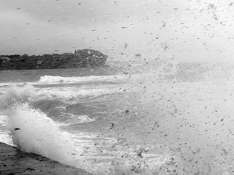 kerri Walker;smashing waves;A stormy day on milford beach