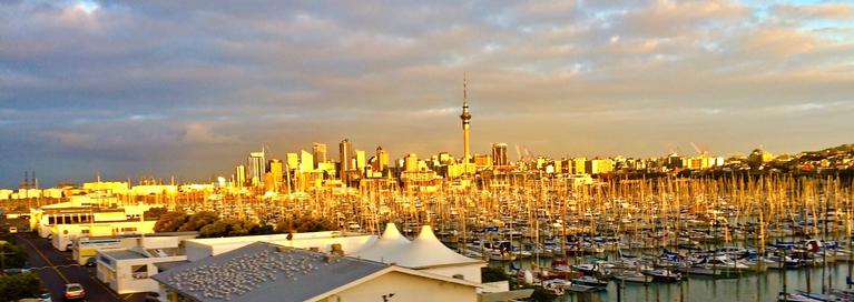 SUNSET OVER AUCKLAND CITY.