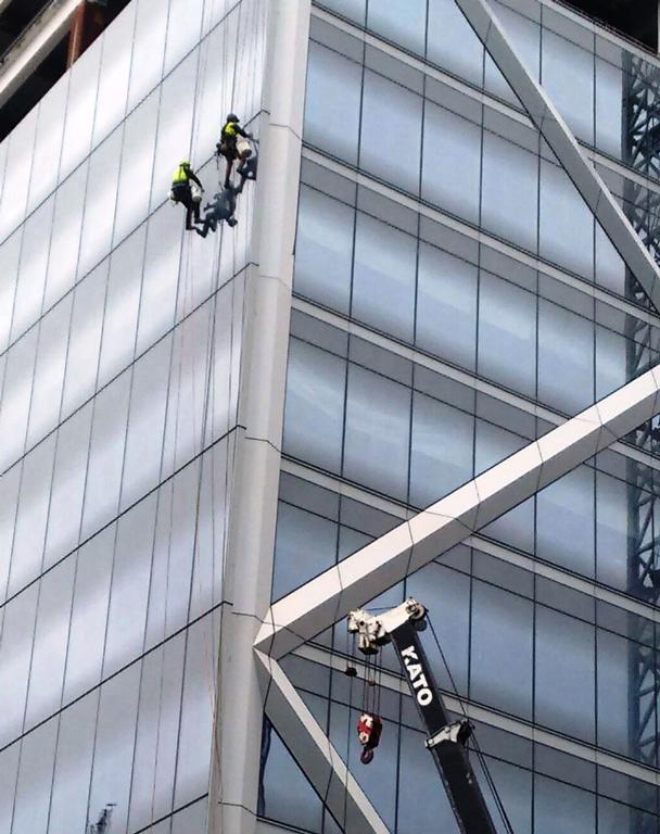 Stuart Weekes;Never too soon;Window cleaners at work on the ( incomplete ) Commercial Bay tower