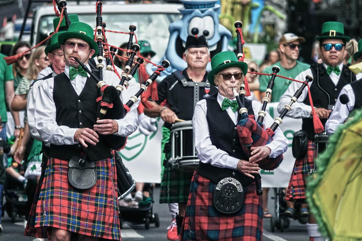 guohua wu;bagpipe playing;Taken at the St. Patrick's Day Parade on Queen Street in Auckland on March 18, 2023.