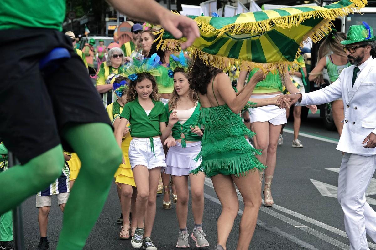 guohua wu;in joy;Taken at the St. Patrick's Day Parade on Queen Street in Auckland on March 18, 2023.