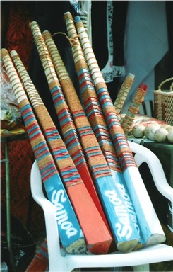 Julia Cotton; Kilikiti bats for Sale; One of the Pasifika 2006 stalls sells traditional Samoan cricket bats