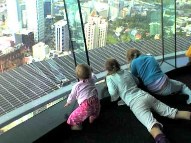 Tavia Khaine; High above Auckland for the first time; Sharni, 8mths, on her first visit to the Skytower, with her big sisters watching the jumpers, its just a phone pxt but we love it!
