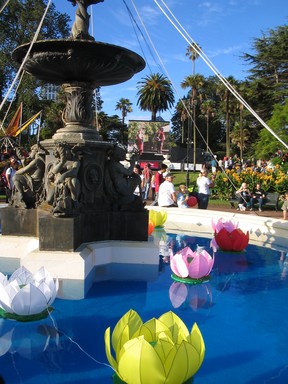 Katyanne Topping; The Festival, the Flowers, and the Fountain; Taken at the 2006 Lantern Festival in Albert Park. The lanterns in the Fountain area look amazing against the spectacular blue water, and the dark fountain.