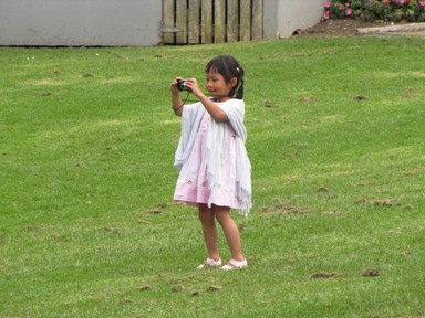 JERRY ZINN;Learning young; Could not resist capyuring this budding photographer at Puhoi