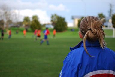  Alicia watches her Dad play for Fencibles United FC, still in her own Fencibles uniform from her earlier game.
