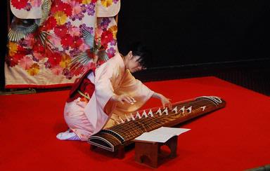 Karlyn Tefora; Koto; A Japanese Woman playing Koto during Japanese Festival in ASB Grounds, Auckland 2010. Koto is the national instrument of Japan