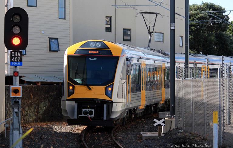 John McKillop; Leaving Onehunga; Electric train on the first operating day.