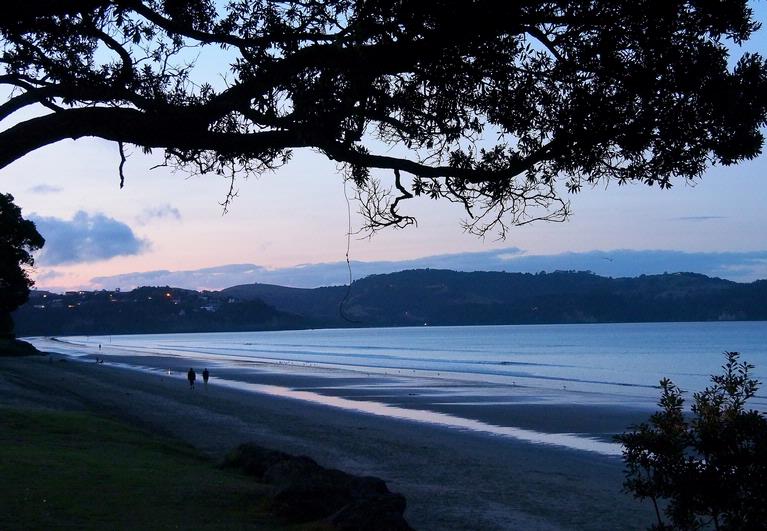 Julie Simpson; Orewa Beach tranquil at sunset