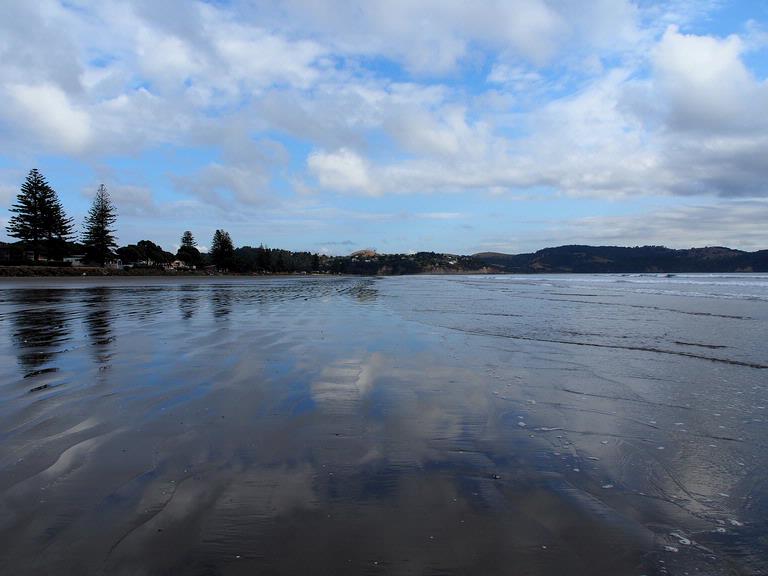 Julie Simpson; Orewa Beach Reflections