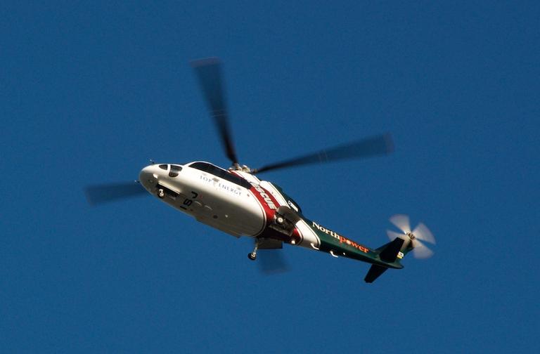 Paul Craze;Rescue Helicopter;A rescue helicopter heading towards Auckland hospital