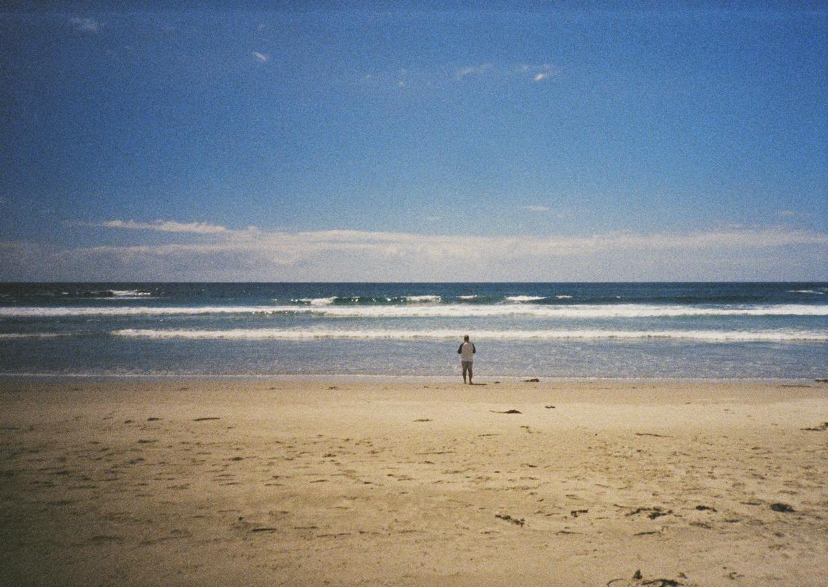 Dave Cao; Sea; A man looking at the sea