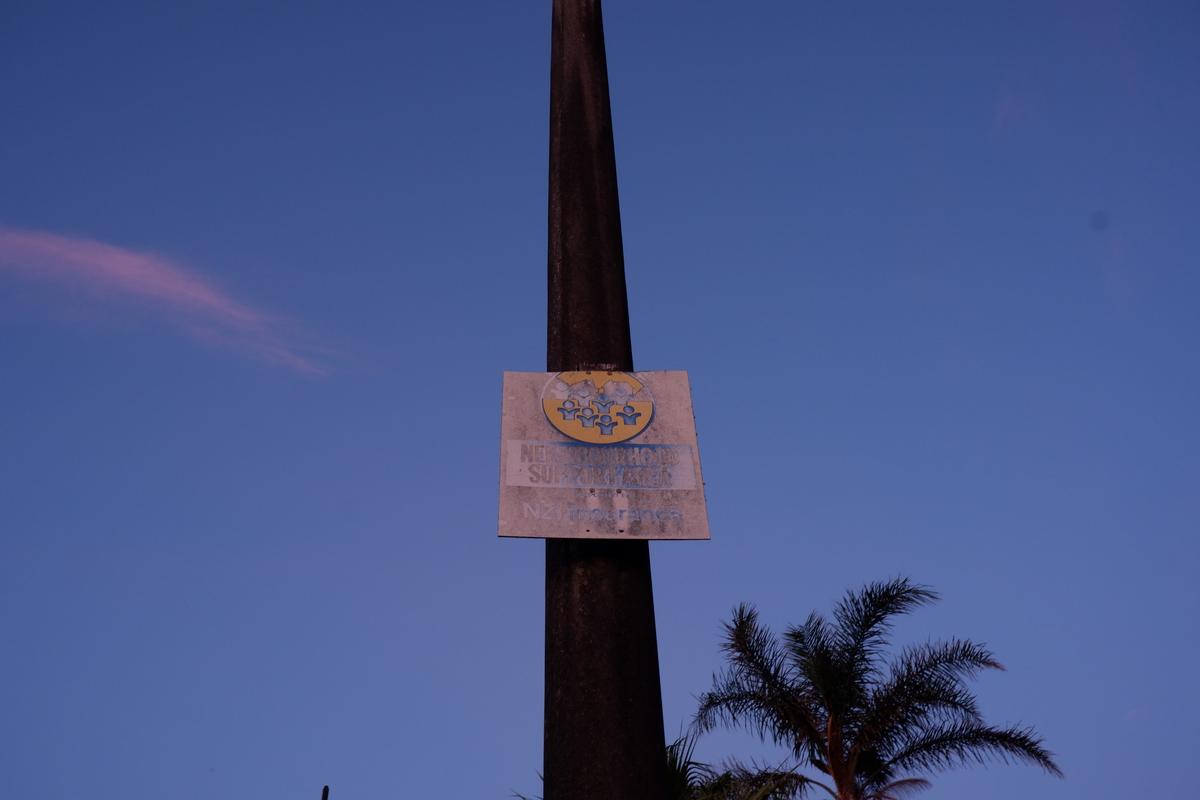 Elizabeth Pham;Neighbourly;It's a sign   a faded sign.