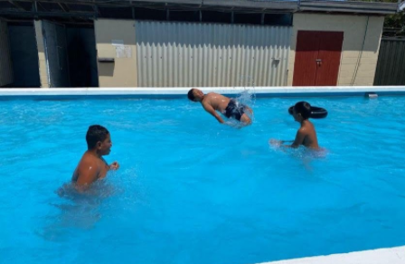 Joanna; Swimming; This is us swimming and it is a cool photo because it looks like the person is flying