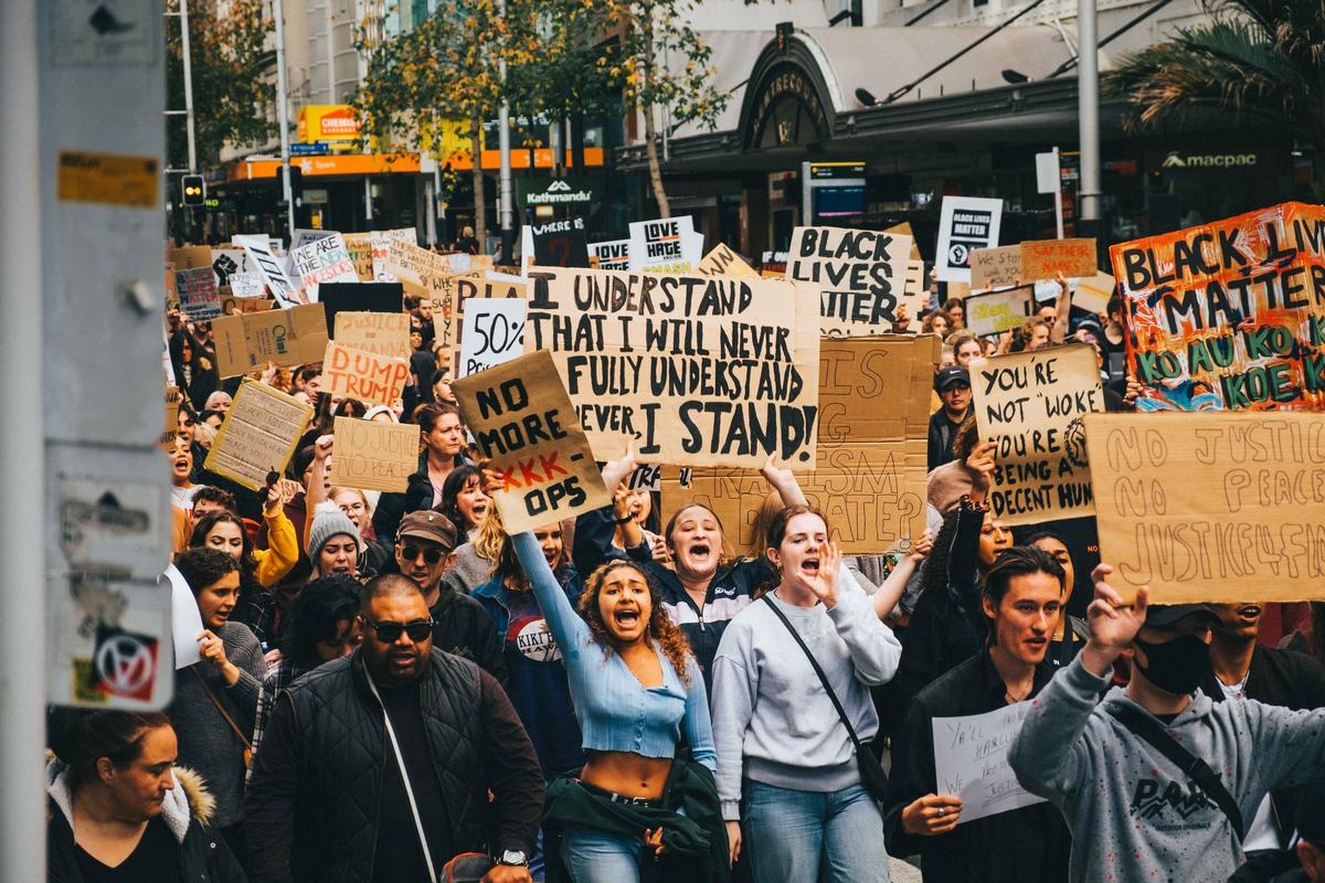 Mattheus Elwood; BLM Protest Queen Street ;The closer you look the more emotion and meaning you can see, from the anarchy symbol on the road sign to the expression of the passionate protesters.