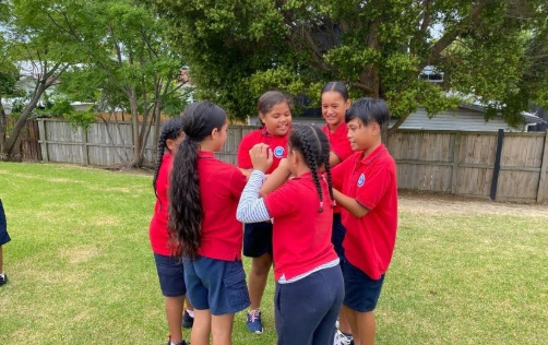 soana; Playing the human knot game; fun and working out as a team