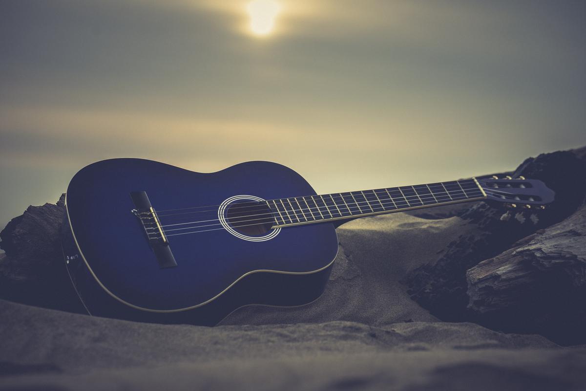 Paul Belli; Music and the beach; This beautiful guitar deserved a portrait shot of it all on it's own.
