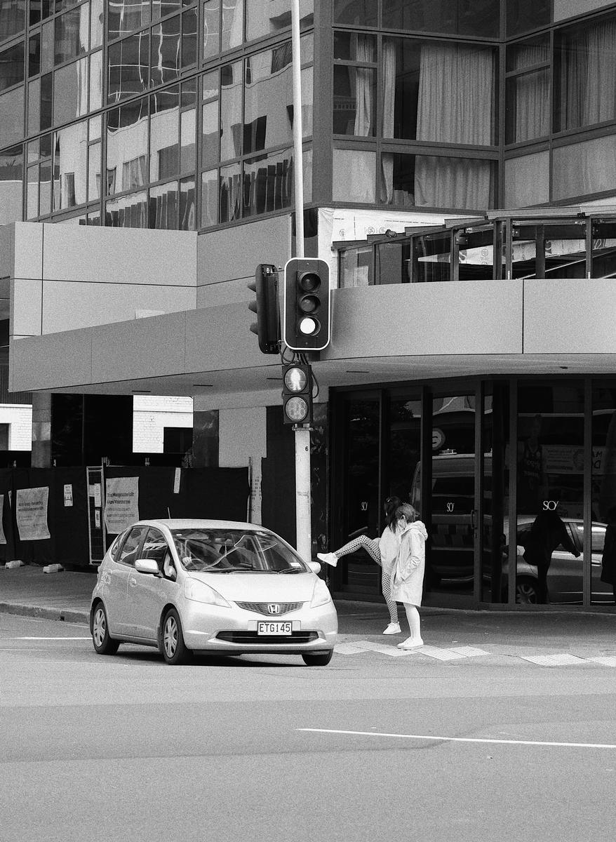 Beverly Jong; Kicking the pedestrian crossing button;Who else does this?