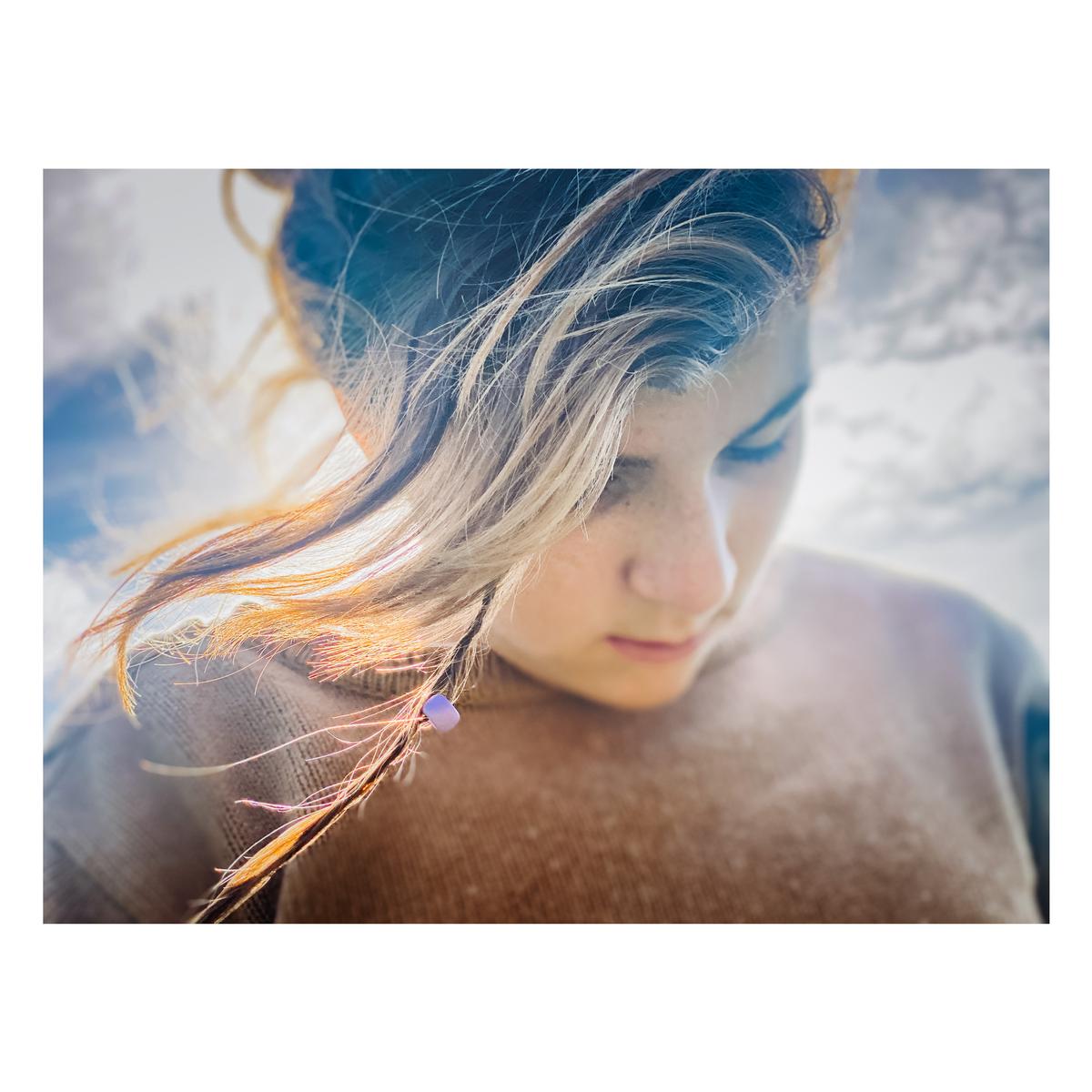 Melissa Jackson; Enjoying the sunshine;Captured on a bubble walk, a lone hair bead captures the light