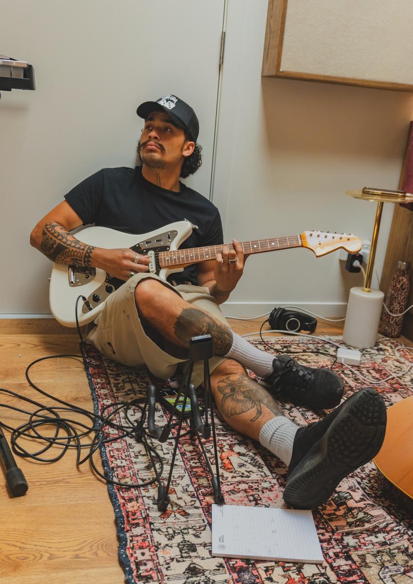  I was documenting APRA SONGHUBS and was asked to document many musicians in studio sessions throughout the week. Something about Reiki just sitting on the ground with a guitar, squashed in to this studio really caught my attention