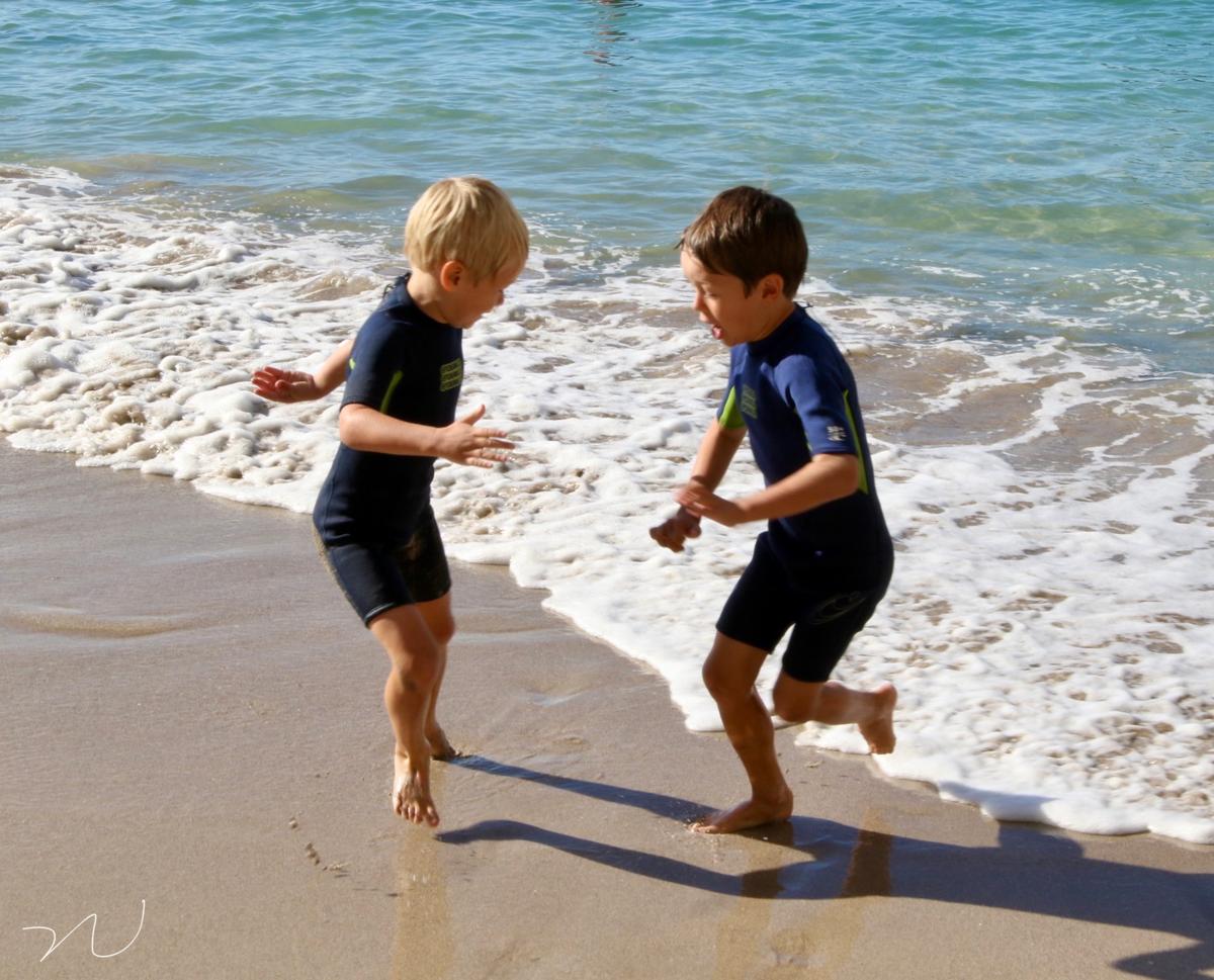 Chenguang Nie;Two Boys in the beach ;The playfulness of two little boys in the beach