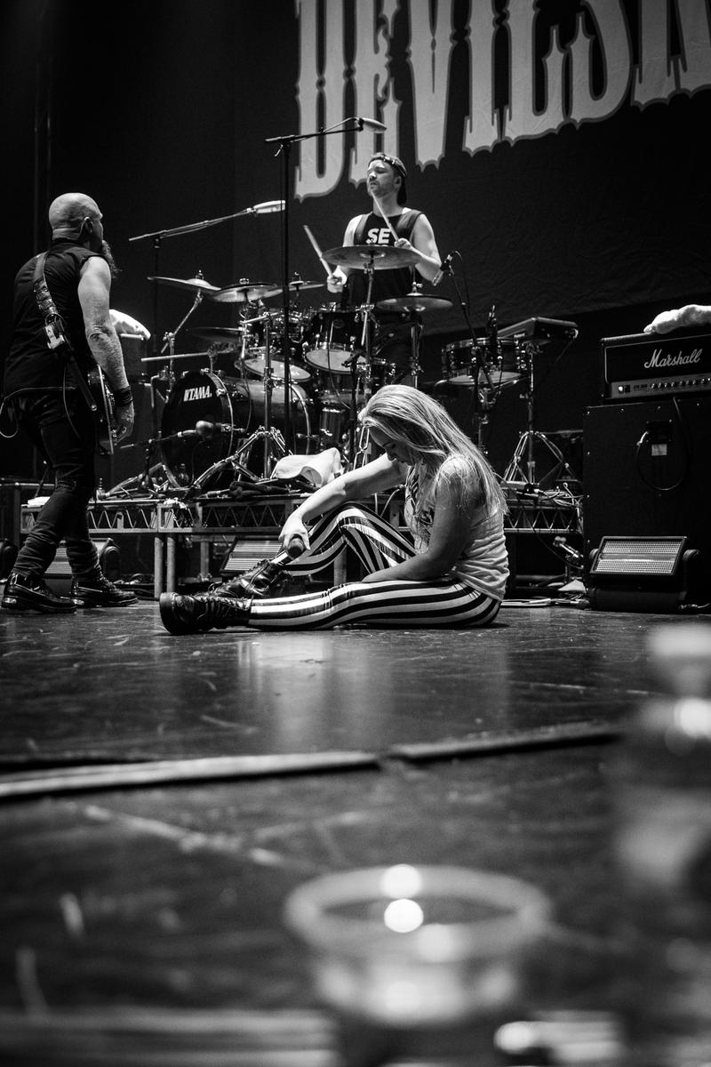 Bevan Triebels;Jennie taking a rest;image taken during soundcheck, Jennie from Devilskin having a quick rest.