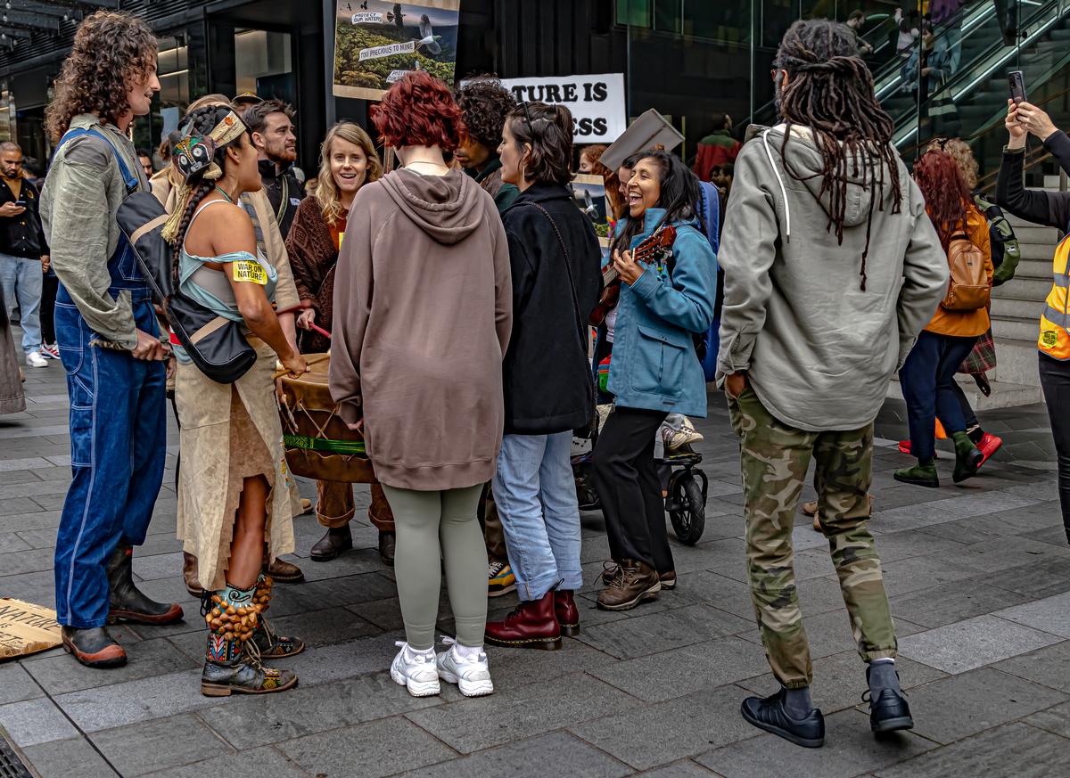 Margaret V Vickers;This image shows a cross section of New Zealanders in Te Komititanga Square making music, at the completion of the Greenpeace March on Nature.