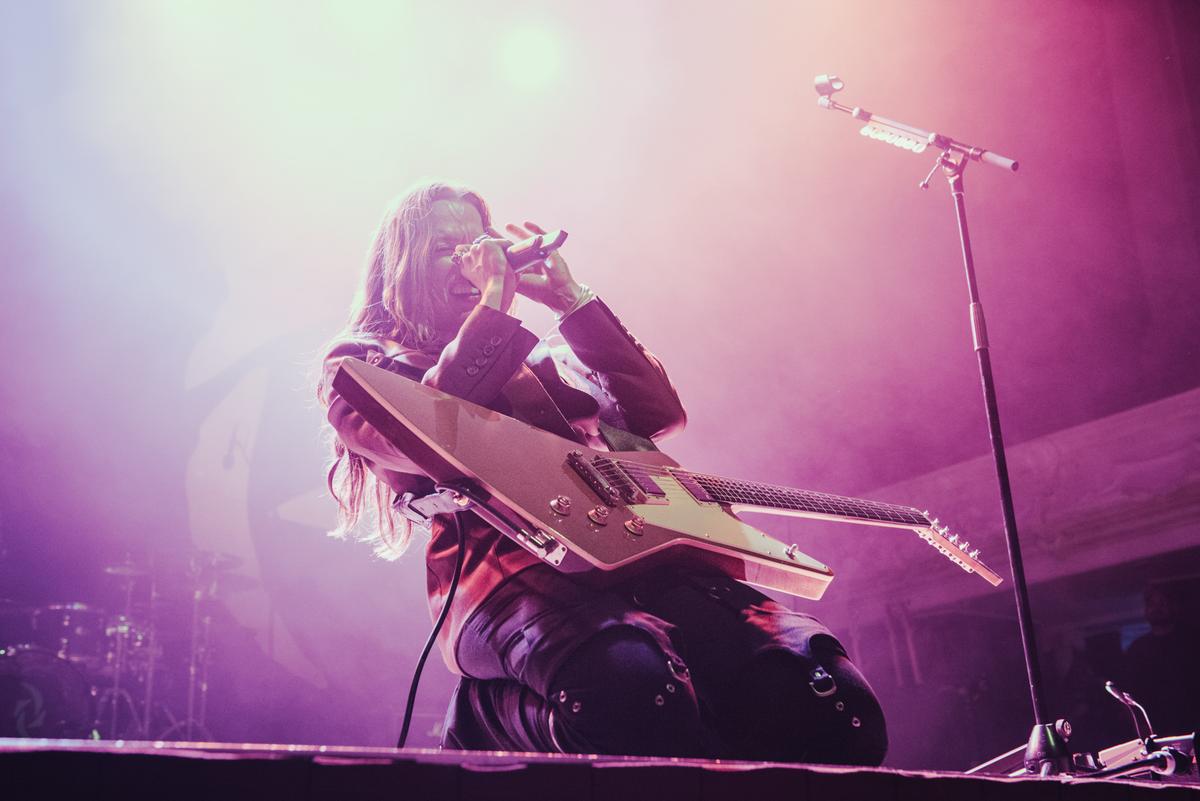 Azrie Azizi;Halestorm's Hurricane;Lzzy Hale in a trance with her mic and ax.