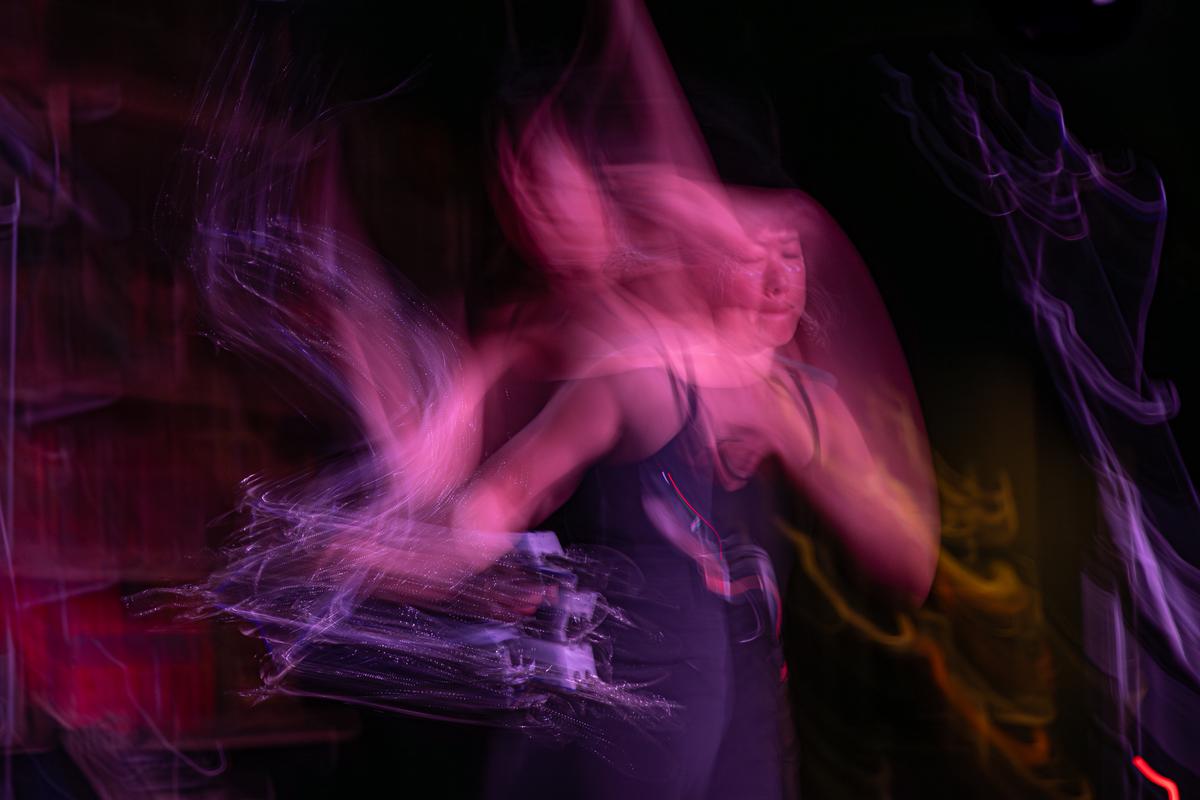 Stella Gardiner;Sparkle Motion;KITA was playing a low key show during which she whipped out her favourite instrument   a star shaped tambourine. It had silver tassels that shimmered and I thought a slow shutter speed might capture their sparkley motion and show KITA lost in the moment.