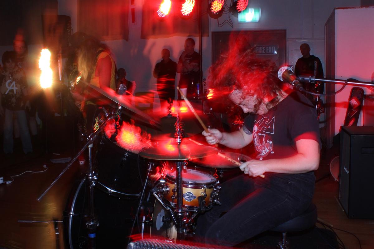 Mars Cook;Hit;I find that drummers often forget theyre being watched when performing and as a result it's a fun challenge to get dynamic looking photos of them. I like how this one from Fullnoise 2025 turned out.