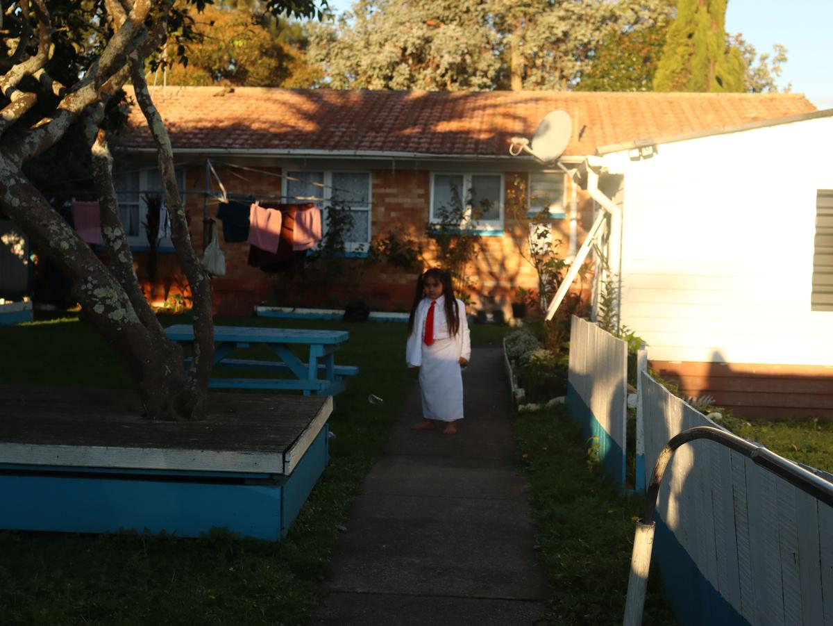 Rose Fifita;Golden sunday;snapped after White Sunday, when all the kids dress up. That’s his house right behind the church, the kind of Sundays that stick with you. Golden hour, golden memories.