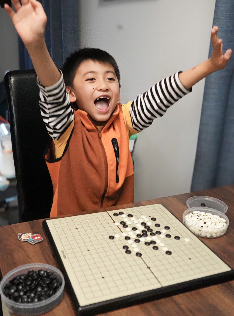 Yong Liu;Hi Mum, I have beaten my dad!